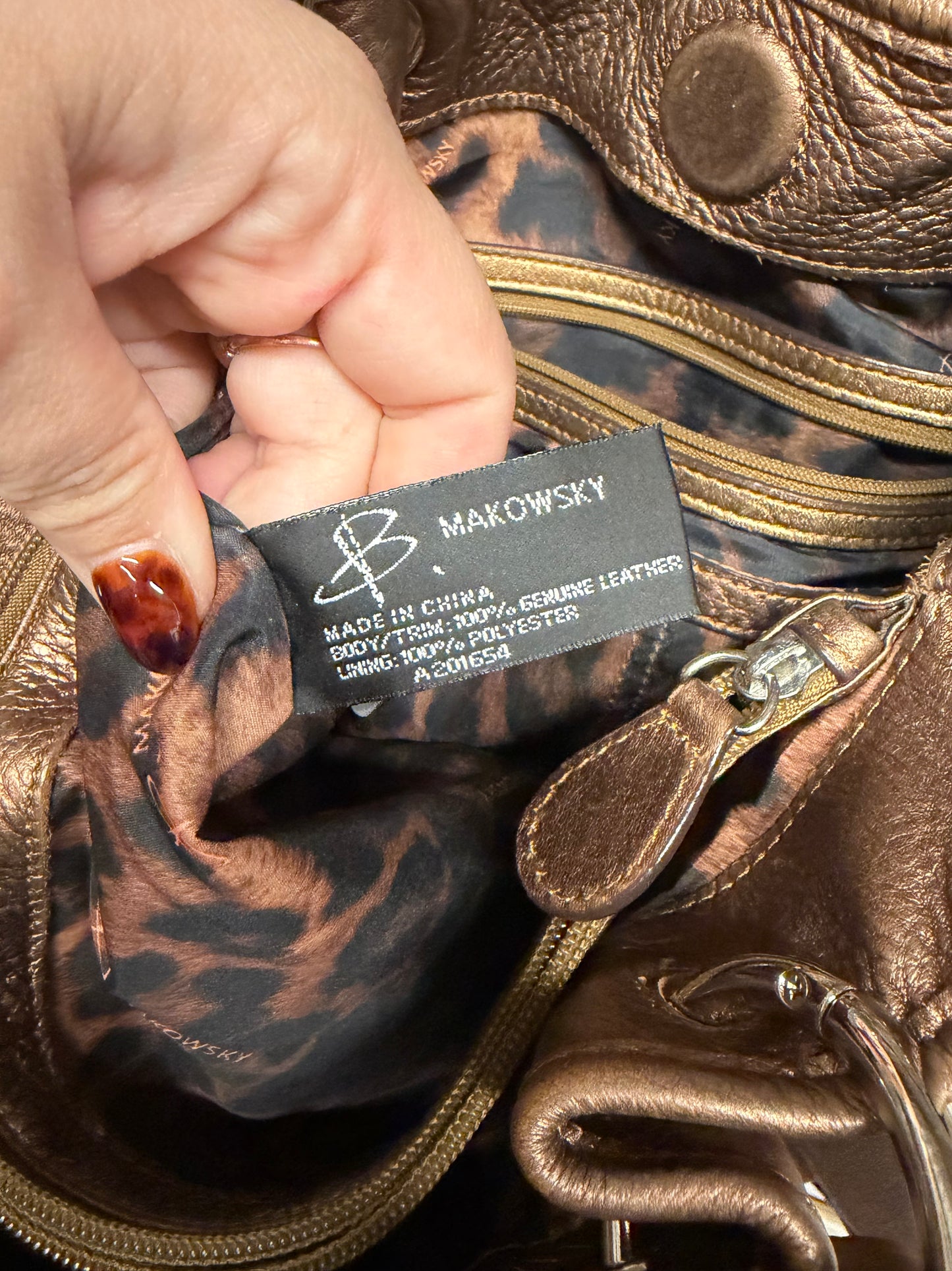 B. Makowsky Copper leather handbag